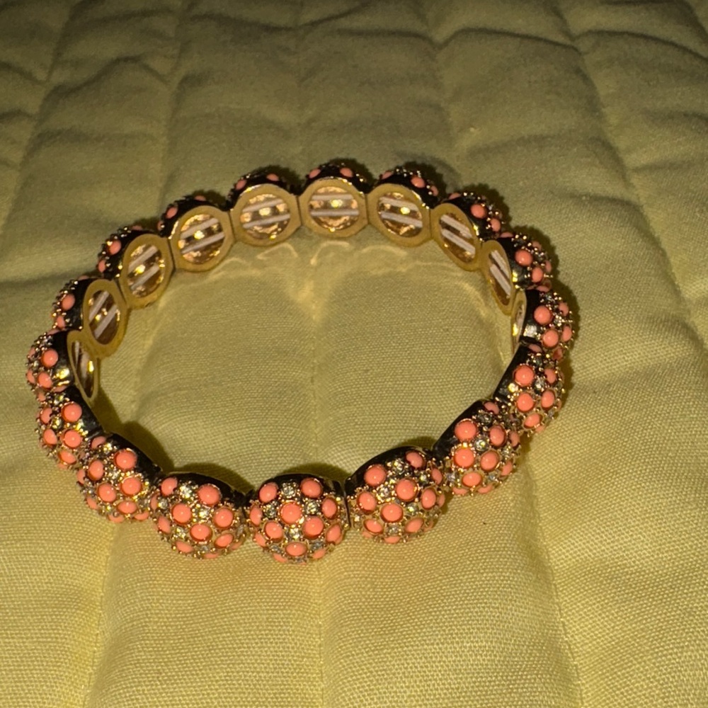 Gt stretch bracelet, 1/2 spheres w/tiny orange beads, see photo for size $10